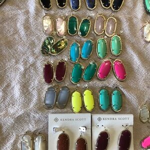Bundle of Kendra Scott Elle earrings in gold. 18 pair pictured.